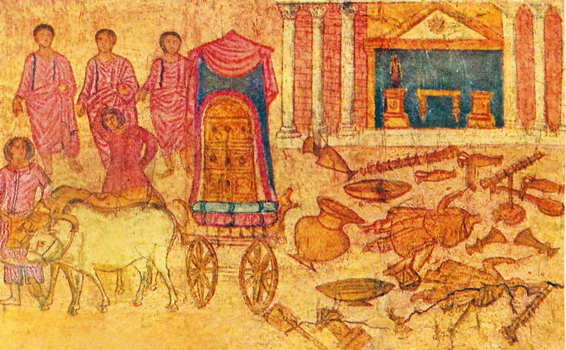 Wall painting: a chest with panelled doors under a red canopy, on a cart drawn by oxen and led by men in pink robes, beside a columned temple whose cult objects lie broken on the ground