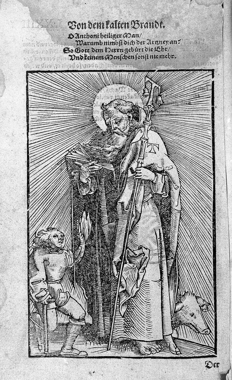 Woodcut of St Antony the Abbot, haloed, with a Tau-headed staff and bell, a pig at his feet, beside a small cripple on crutches whose raised hand is in flames; above, a printed verse headed Von dem kalten Brandt